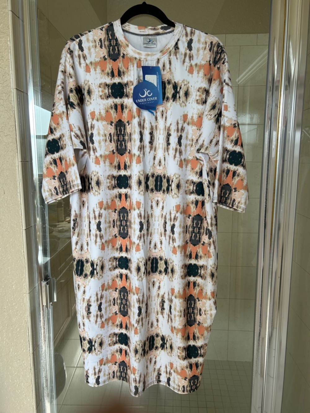 Undercover Women’s One-Piece Swim Dress in White, Peach & Black Print